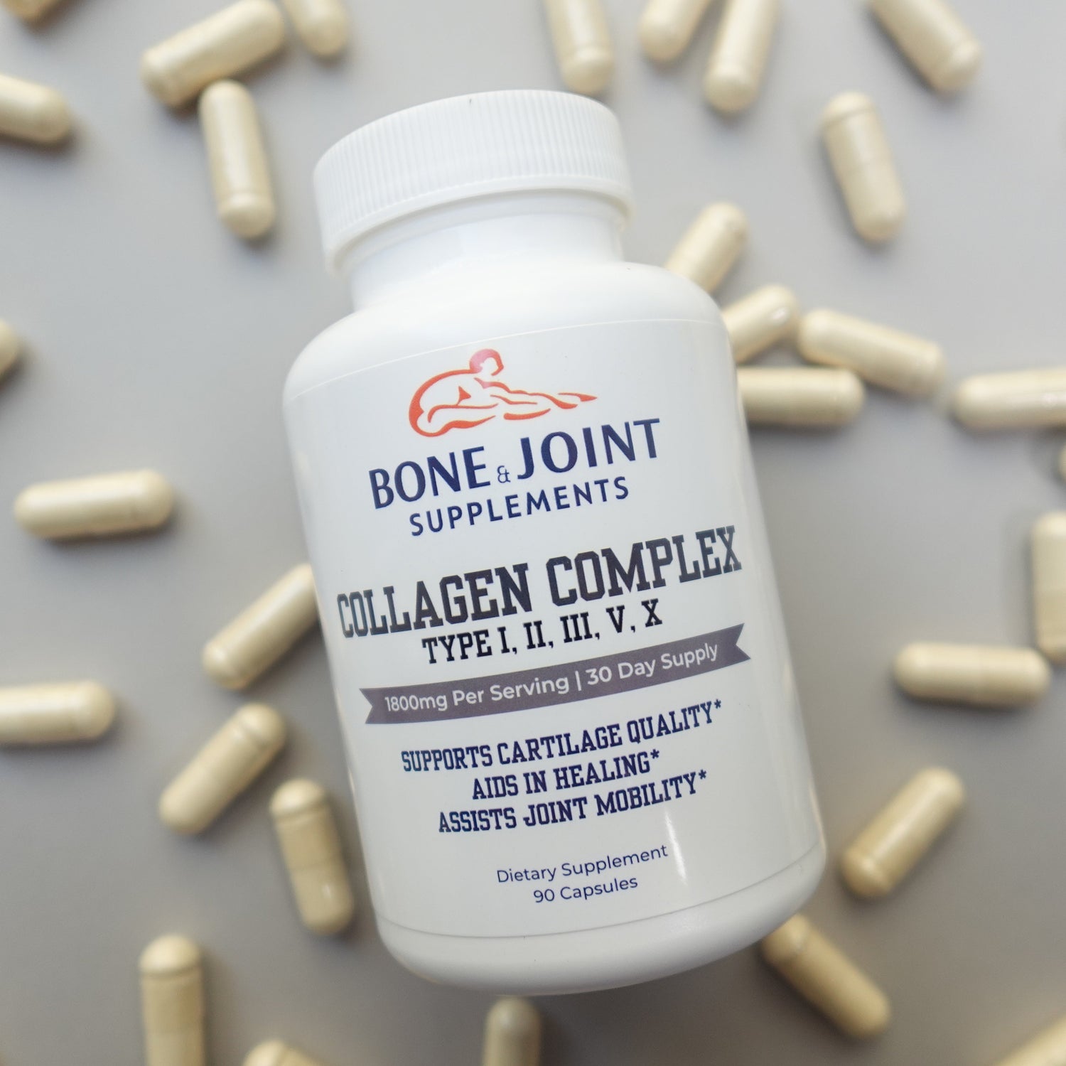 Bottle of Bone & Joint supplement with capsules on a light gray background